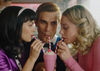 Lili Reinhart KJ Apa and Camila Mendes sharing a milkshake in Riverdale