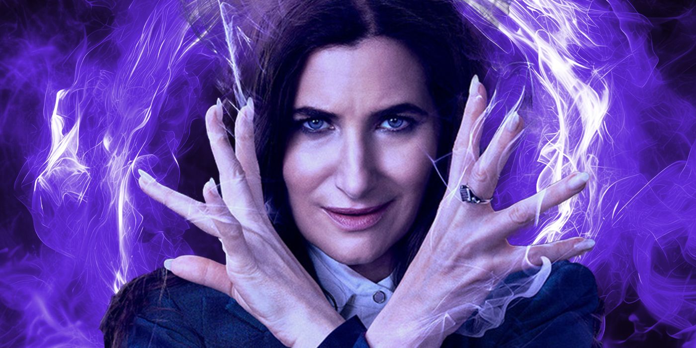 Agatha Harkness with her hands exuding purple magic by her face