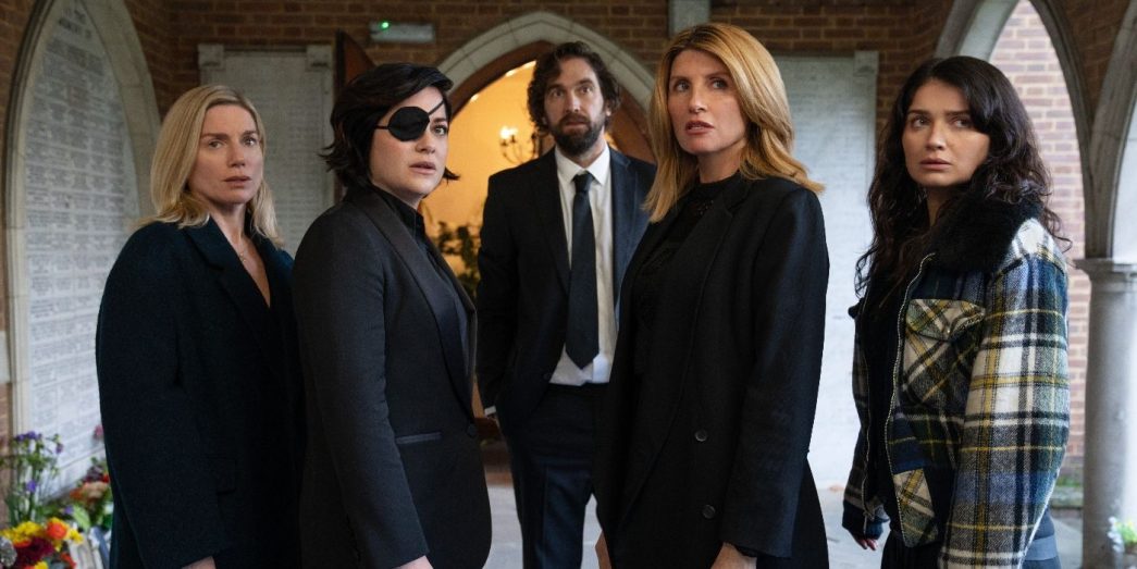 Eva Birthistle, Sarah Greene, Sharon Horgan, and Eve Hewson standing in a church