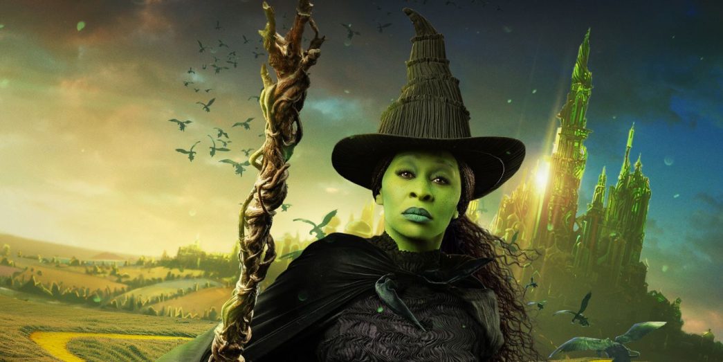 Cynthia Erivo as Elphaba wearing her witches outfit while walking away from the emerald city.