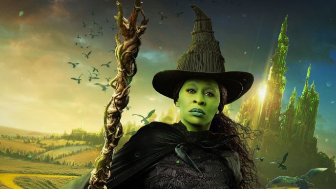 Cynthia Erivo as Elphaba wearing her witches outfit while walking away from the emerald city.