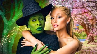 Glinda, played by actor Ariana Grande, drapes her arms around Elphaba, played by actor Cynthia Erivo, against a backdrop of green and pink trees.