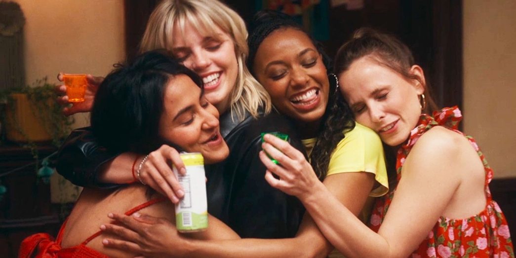 Bela (Amrit Kaur), Leighton (Renee Rapp), Whitney (Alyah Chanelle Scott), and Kimberly (Pauline Chalamet) hugging in The Sex Lives of College Girls Season 3