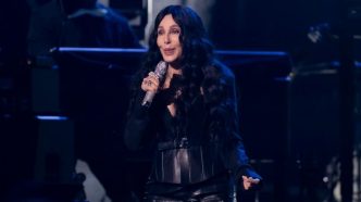 Cher singing on stage at the 2024 Rock and Roll Hall of Fame Induction Ceremony