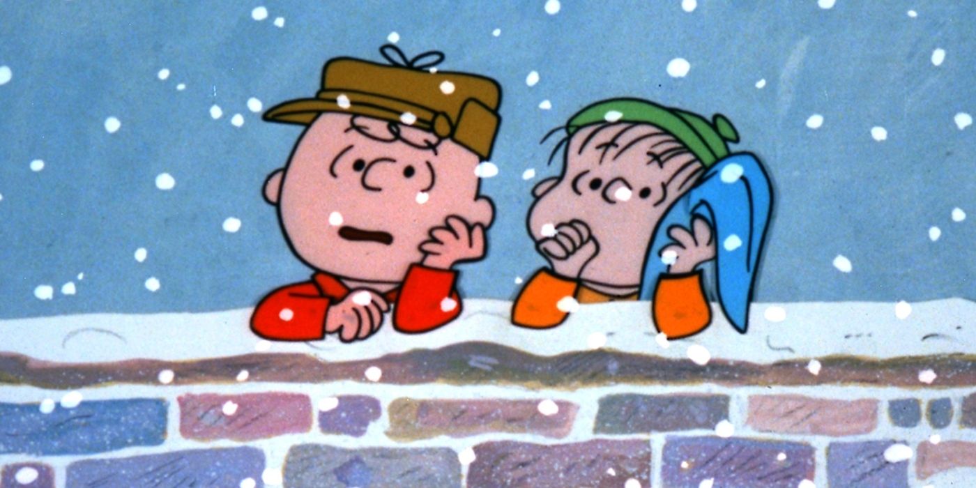 Charlie (Peter Robinns) et Linus (Christopher Shea) appuyés sur un mur de briques dans A Charlie Brown Christmas